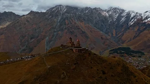 Aerial hyperlapse of of Gergeti Trinity Church Stock Footage 320253936