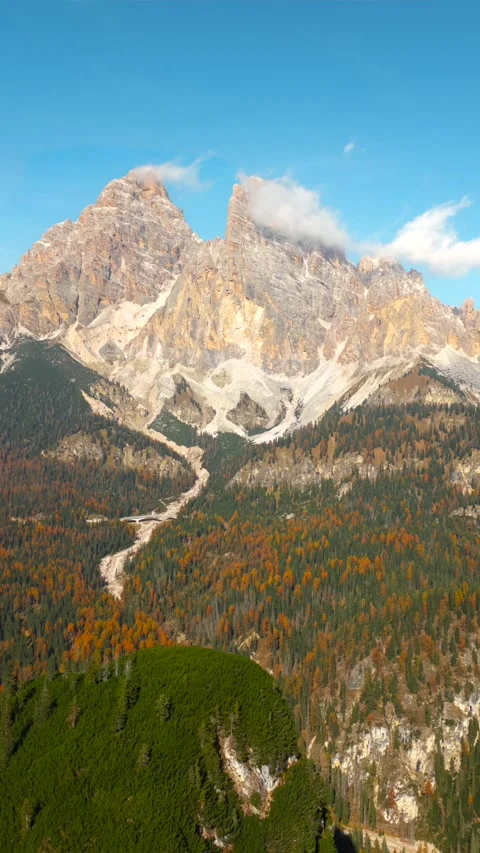 Aerial hyperlapse of high mountain peak with clouds in Dolomites, Italy Stock Footage 301540783