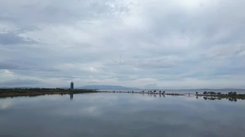 Aerial Hyperlapse of Lake, Clouds, and Red Bridge in Izmir Stock Footage 323291983