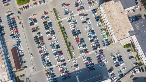 Aerial hyperlapse of large area of office buildings and Parking lots. Lots of Stock Footage 113614420