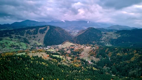 Aerial hyperlapse with lateral orbit motion over autumn mountain valley and Stock-Footage 319830848