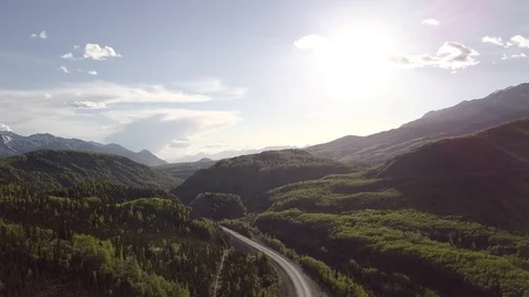 Aerial hyperlapse of mountain clouds in Alaska near highway Stock Footage 113574449