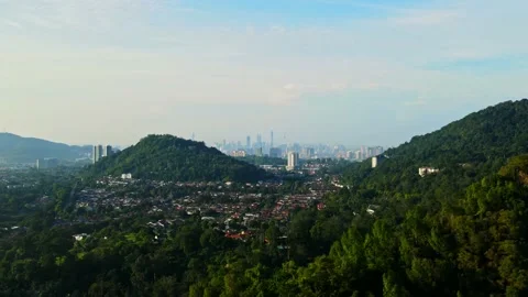 Aerial Hyperlapse from mountain range towards Kuala Lumpur City Stock Footage 152938147
