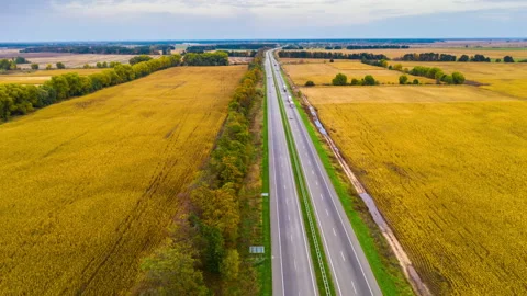 Aerial hyperlapse of moving freeway traffic on the highway in the countryside. Stock Footage 142055631