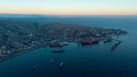 Aerial hyperlapse in orbit panoramic view of the city of Valparaíso at sunrise Stock Footage 334225964