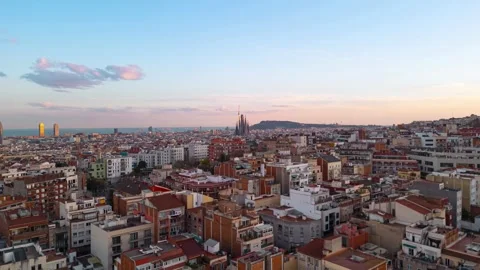 Aerial hyperlapse over Barcelona at sunset with Sagrada Familia church, a t.. Stock Footage 304446910