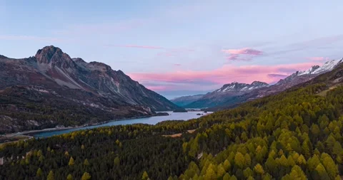 Aerial Hyperlapse Over Maloja Pass Swiss Alps With Forested Valleys and Serene Stock Footage 334100761