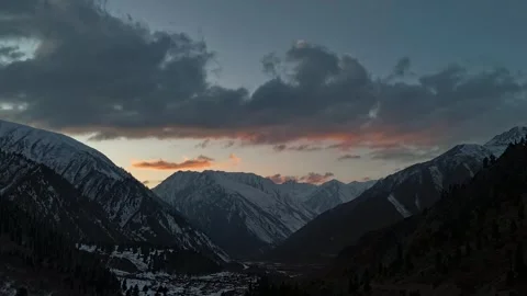 Aerial Hyperlapse Over Mountain Valley with Fast Moving Sunset Clouds Stock Footage 330440556