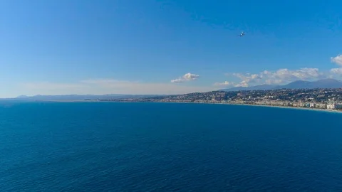 Aerial hyperlapse of plane landing in Nice airport on Mediterranean sea 4K Stock Footage 94961737