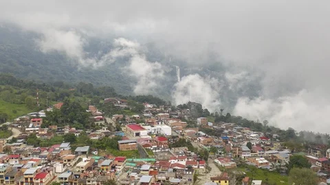 Aerial hyperlapse pushes over town of Florian, Colombia as the clouds come in Video stock 127955183