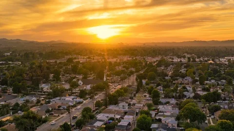 Aerial hyperlapse of scenic sunset San Fernando Valley cityscape. Los Angeles CA Stock Footage