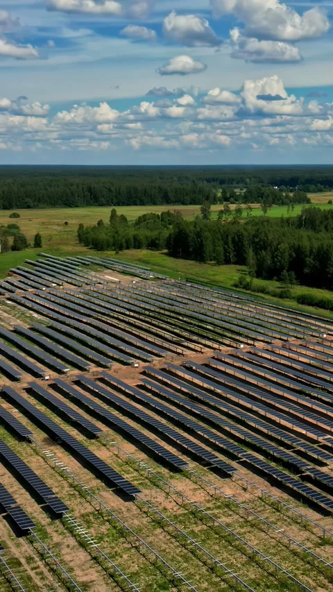 Aerial hyperlapse of a solar farm under construction in Europe. Vertical Stock Footage 318436585