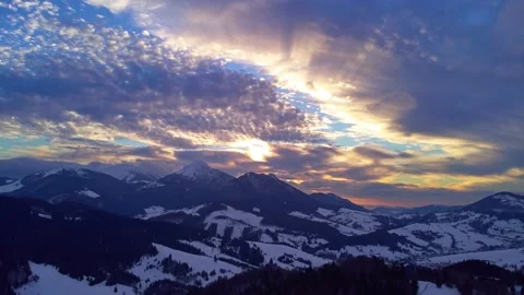 Aerial hyperlapse of sunset and winter forest,colored thick clouds. Hilly Stock Footage 170451818