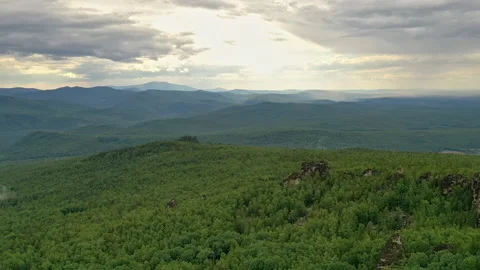 Aerial hyperlapse of sunset in the mountains of Kuturchinsky belogorie, Russia Stock Footage 169300642