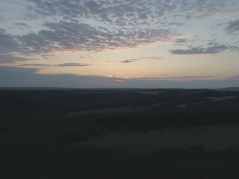 Aerial hyperlapse of sunset over forest Stock Footage 99020109