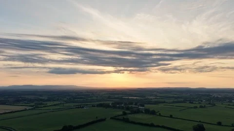 Aerial Hyperlapse of Sunset Over Rural Farmland and Horizon 库存影片 337456578