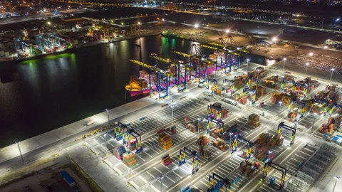 Aerial Hyperlapse Time lapse. Container ships in the harbor with bridges Crane  Stock Footage 112400006