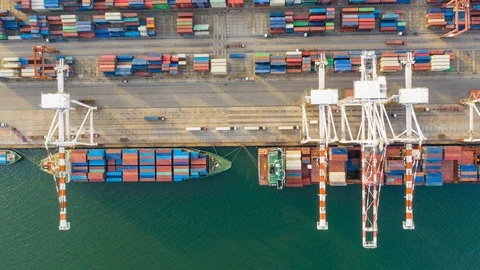Aerial Hyperlapse Time lapse. Container ship in pier with crane bridge  스톡 동영상 112400084