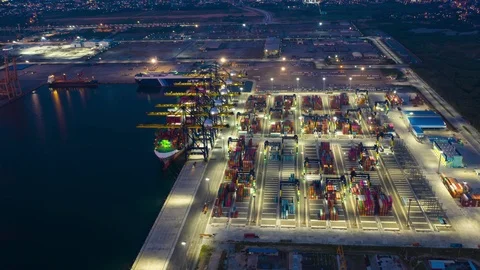 Aerial Hyperlapse Time lapse. Container ships in the harbor at night Stock Footage 117043386