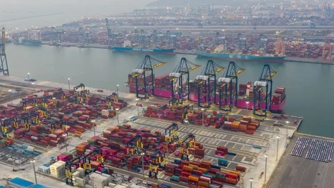 Aerial Hyperlapse Time lapse. Container ship in pier with crane bridge Stock Footage 123286435