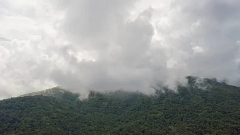 Aerial Hyperlapse Time lapse. Mountains lush in rain clouds Stock Footage 116554845