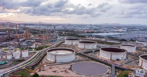 Aerial Hyperlapse Time-lapse of the refinery and oil tank at dusk. Business a Stock Footage 196597373