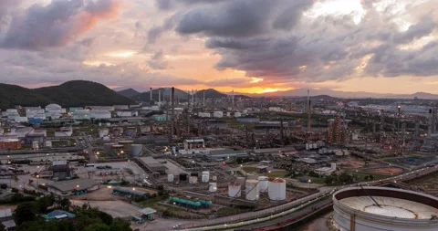 Aerial Hyperlapse Time-lapse of the refinery and oil tank at dusk. Business a Stock Footage 196597382