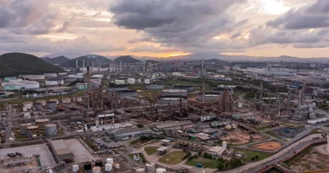 Aerial Hyperlapse Time-lapse of the refinery and oil tank at dusk. Business a Stock Footage 196597534