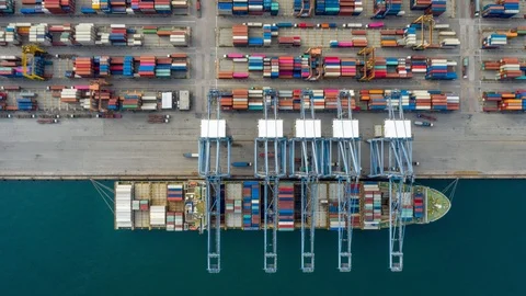 Aerial Hyperlapse Time laspe. top view container ship in pier with crane bridge Stock Footage 113287190