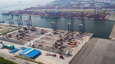 Aerial Hyperlapse Time laspe. top view container ship in pier with crane bridge Stock Footage 115645694