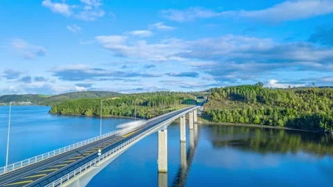 Aerial Hyperlapse - Timelapse of traffic on a bridge over a fjord Stock Footage 286108391