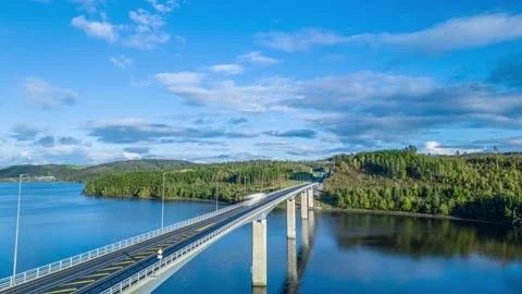 Aerial Hyperlapse - Timelapse of traffic on a bridge over a fjord Stock Footage 286108404