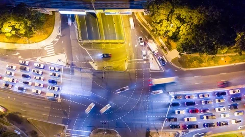 Aerial hyperlapse of traffic at a busy intersection at night Stock Footage 108517102