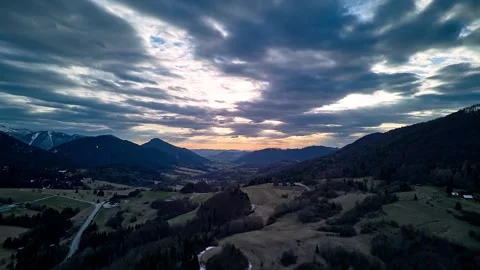 Aerial hyperlapse of twilight with cloudy sky and rural road in countryside Stock-Footage 308388627