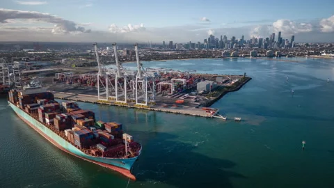 Aerial hyperlapse video of container ship departing from Port of Melbourne Stock Footage 199203904