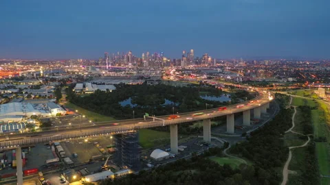 Aerial hyperlapse video of Melbourne CBD transiting from day to night Stock Footage 165729686