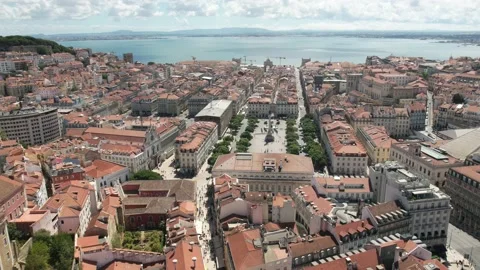 Aerial hyperlapse view towards Baixa District in Lisbon, Portugal on a sunny day Stock Footage 207469253