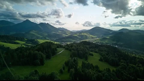 Aerial Hyperlapse,Dramatic Clouds Moving Fast over European Mountains and Stock Footage 317242921