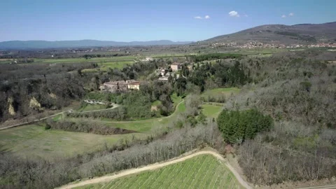 Aerial il Borro reverse 4K view Tuscany valley Arezzo Italy Stock Footage 185624987