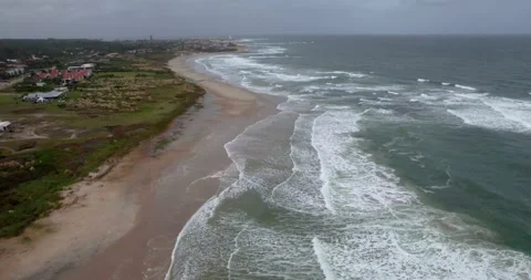 Aerial image of a beach on a cloudy day with a little haze. it is a winter day. 動画素材 261074415