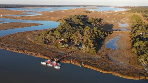 Aerial imagery of South Carolina Lowcountry Kiawah Island and Kiawah River Stock Footage