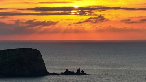 Aerial images of the sunset on islets in front of Cala Compte. Stock Footage 237178601