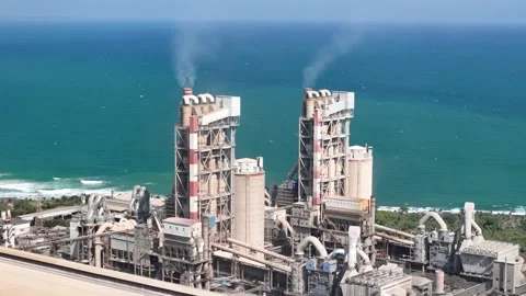 Aerial industrial cement processing equipment representing construction material Stock Footage 340247725