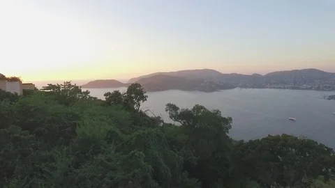 Aerial Infinity Pool flyover Revealing Beautiful Bay at Sunset (60 fps) Stock Footage 78233390