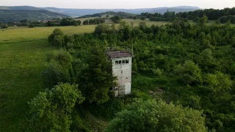 Aerial, inner german border GDR and FRG with watchtower in 4k, Drone, DDR Video stock 156111469