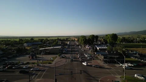 Aerial of intersection on main street in Victor Idaho in summer in Tetons Stock Footage 312908162