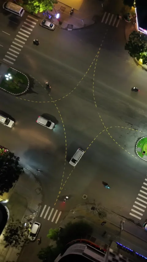 Aerial Intersection Night Rush Under Lights, Busy Urban Junction With Vans Stock Footage 338065155