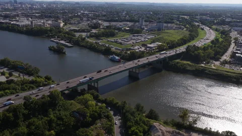 Aerial of interstate 24 bridge crossing the Cumberland river in Nashville Stock Footage 343594734