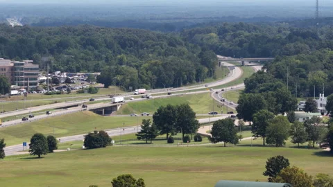 Aerial of interstate 24 interchange in Paducah Kentucky in wooded countryside Stock Footage 344752474