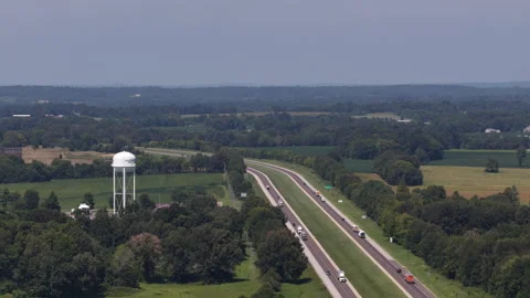 Aerial of interstate 24 in rural forest and farmland in Metropolis Illinois Video stock 343593103